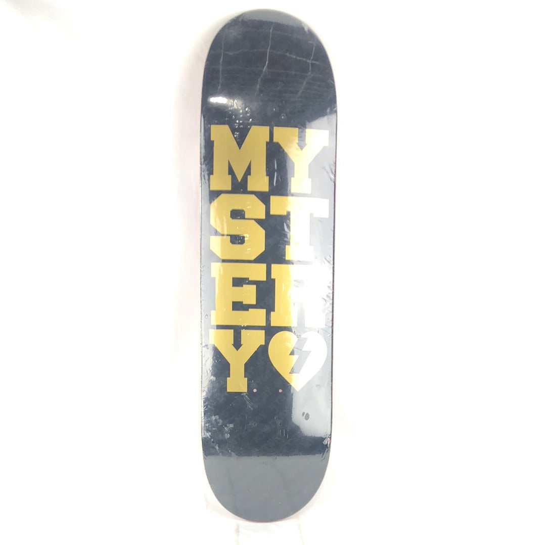 Mystery Vertical Writing Gold/Black Size 8.375 Skateboard Deck